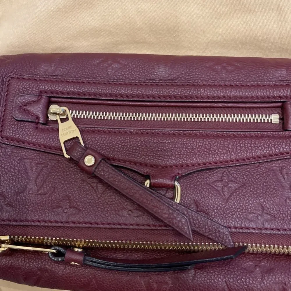 Louis Vuitton Petillante Clutch Monogram Empreinte Leather